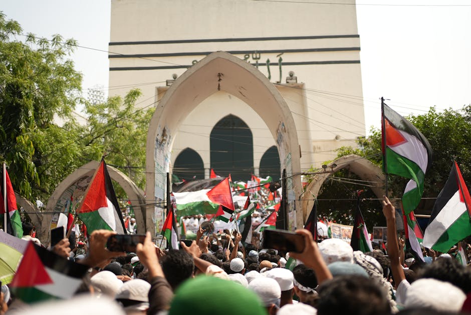 Ceasefire Frays as Iran Accuses U.S. of Breaking Deal 1 A large pro-Palestinian protest in Dhaka, Bangladesh with flags and banners.